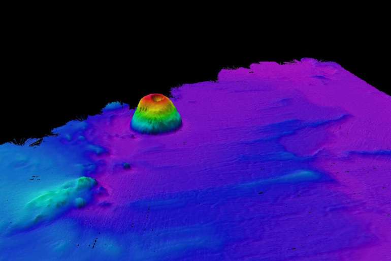 The newly discovered seamount has a unique smooth-sided, tower-like structure. Saildrone / NOAA