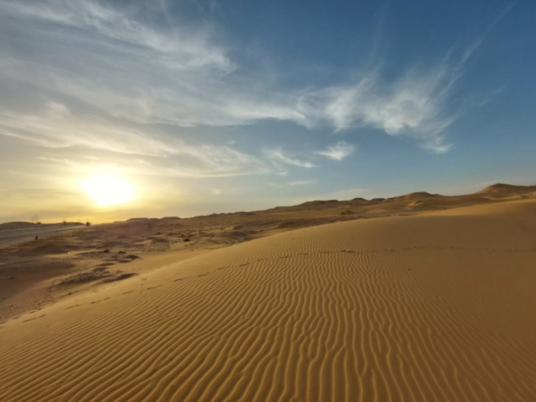 Sunset on a sand dune in the Nafud desert near the Qassim region, Saudi Arabia