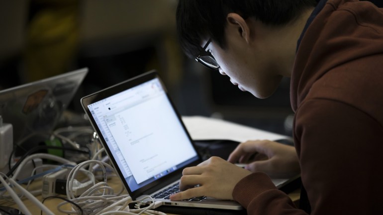 TOKYO, JAPAN - JANUARY 28: A participant uses a laptop computer as he takes part in the Seccon 2016 final competition on January 28, 2017 in Tokyo, Japan. 24 teams from Japan, the US, China, Taiwan, South Korea, Russia, Poland, Switzerland and France competed their skills for cyber securities at the final round of the international cyber security contest in Tokyo. (Photo by Tomohiro Ohsumi/Getty Images)