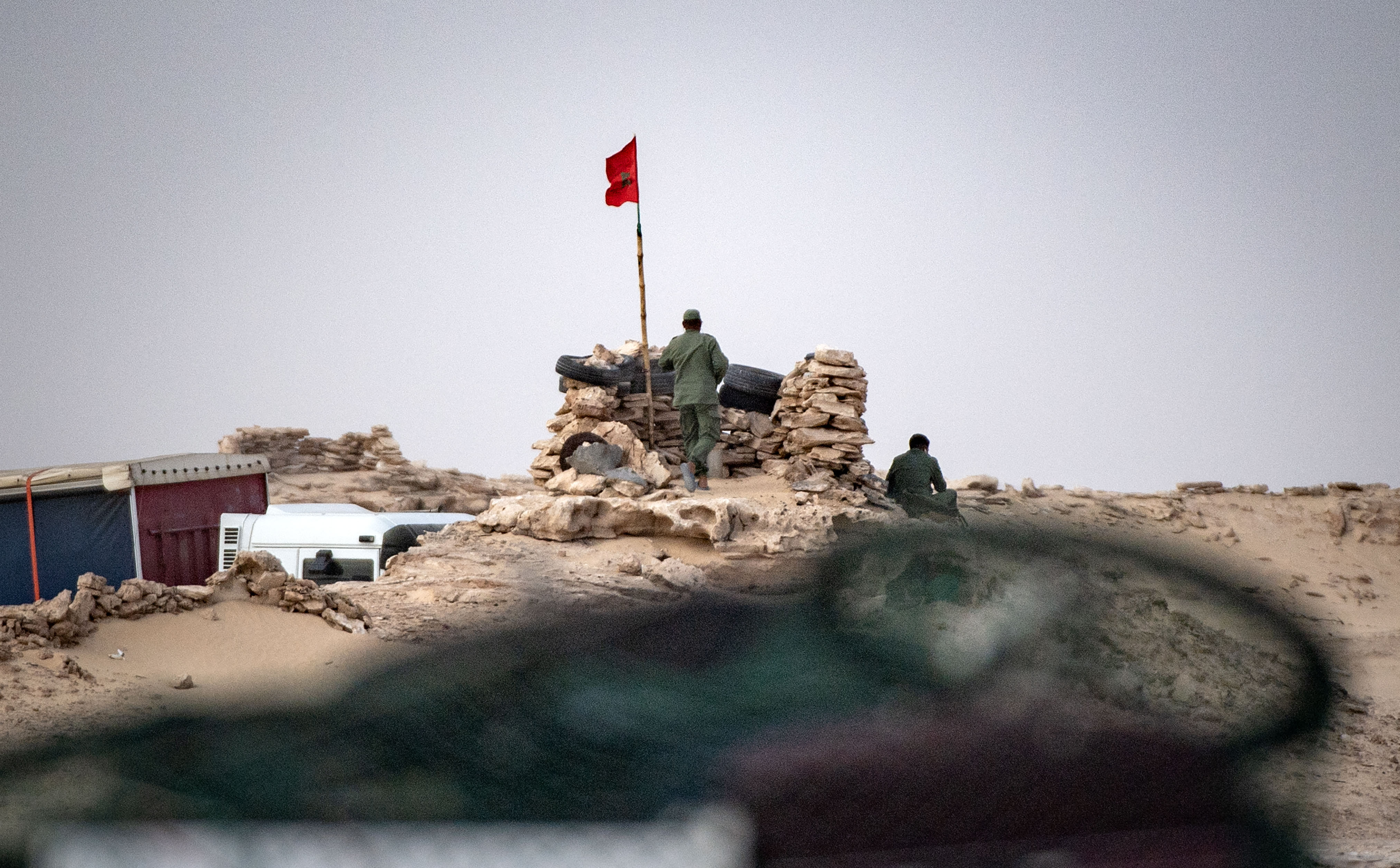 Moroccan soldiers are picture on a hilltop on a road between Morocco and Mauritania in Guerguerat located in the Western Sahara…