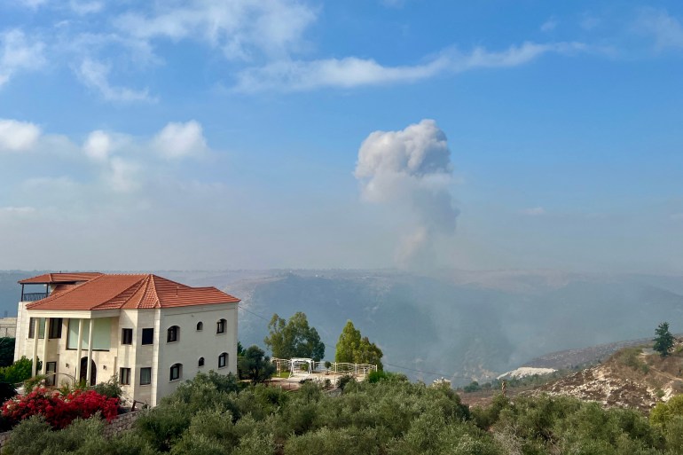 Smoke billows from an area targeted by an Israeli airstrike in the southern Lebanese village of Qsair on August 25, 2024, amid escalations in the ongoing cross-border tensions as fighting continues between Israel and Hamas militants in the Gaza Strip. (Photo by AFP)