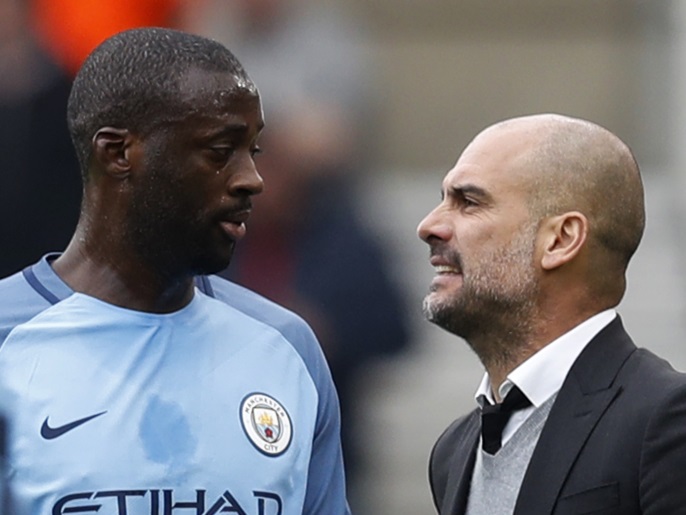 Britain Football Soccer - Middlesbrough v Manchester City - FA Cup Quarter Final - The Riverside Stadium - 11/3/17 Manchester City's Yaya Toure with Manchester City manager Pep Guardiola Reuters / Russell Cheyne Livepic EDITORIAL USE ONLY. No use with unauthorized audio, video, data, fixture lists, club/league logos or