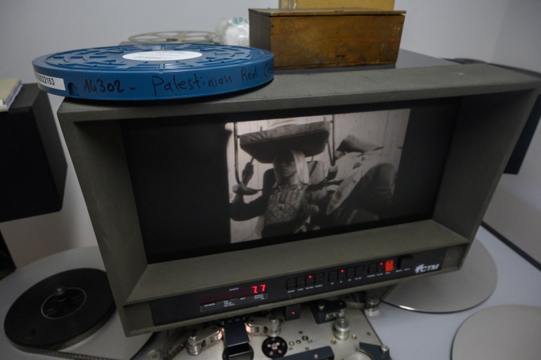 A frame from a film showing scenes of daily life in Palestine, part of a collection of 40 Palestinian films made between 1960 and 1980, is displayed at the Conservation and Research Center of the Toulouse Cinematheque, in Toulouse, southwestern France, on August 1, 2024. - In the early 1980s, the Palestinian Film Institute in Beirut, where around a hundred militant films were stored, was bombed by Israel during the Lebanon war. Its director, Khadijeh Habashneh, fled the country, leaving the reels behind. Almost 40 years later, the 79-year-old former director of the Institute has managed to collect 40 short and medium-length films, in 16 and 30 mm formats, which will be shown to the general public at the Cine Palestine festival in Toulouse. (Photo by Ed JONES / AFP)