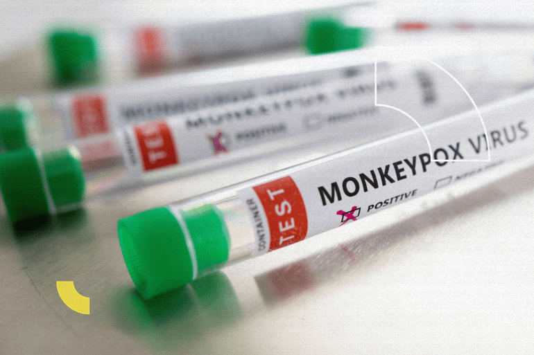 Test tubes labelled "Monkeypox virus positive" are seen in this illustration taken May 22, 2022. REUTERS/Dado Ruvic/Illustration