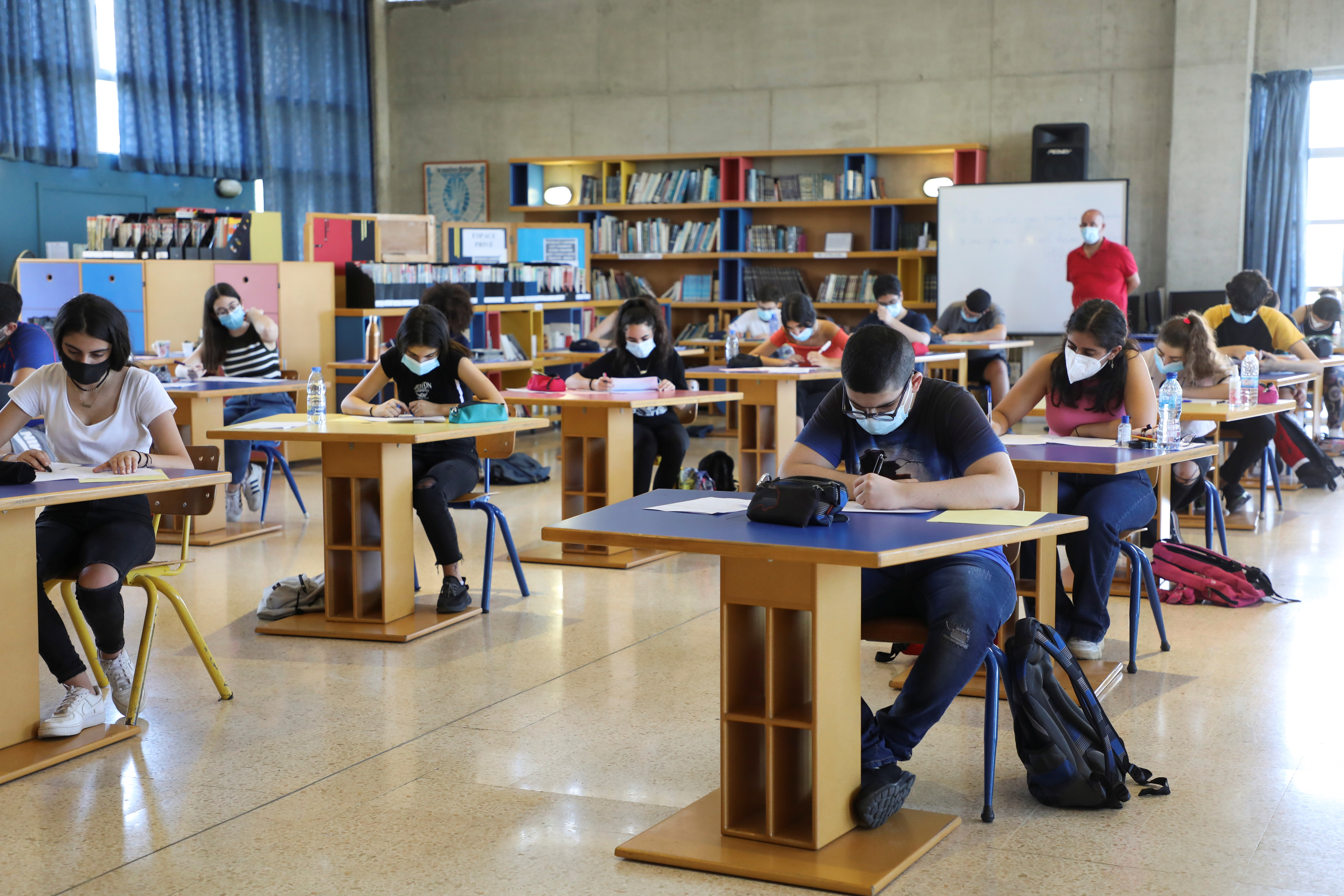 Students sit for an exam at Saints Coeurs Ain Najm school in Mansourieh, Lebanon, June 29, 2021. Picture taken June 29, 2021. REUTERS/Mohamed Azakir