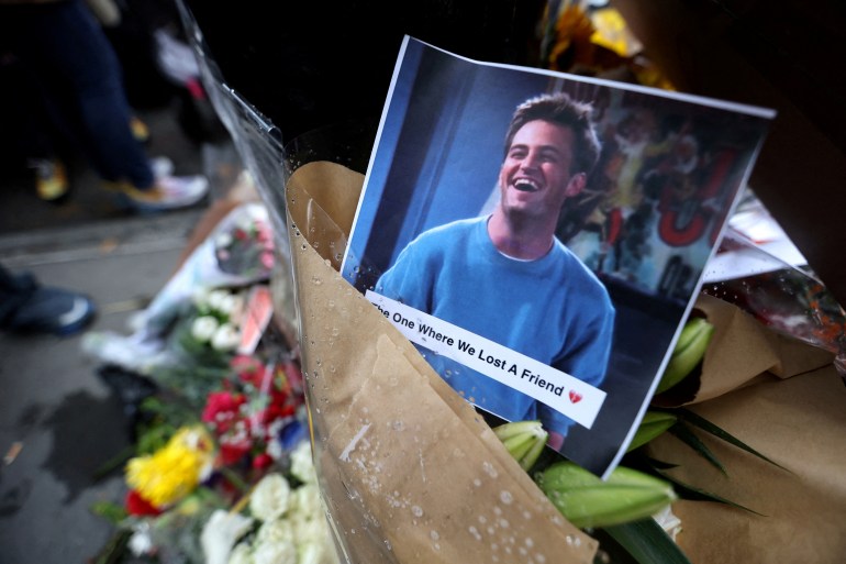 FILE PHOTO: A makeshift memorial for actor Matthew Perry, the wise-cracking co-star of the 1990s hit television sitcom "Friends," who was found dead at his Los Angeles home October 28, is pictured on Bedford Street in Manhattan in New York City, U.S., October 30, 2023. REUTERS/Mike Segar/File Photo