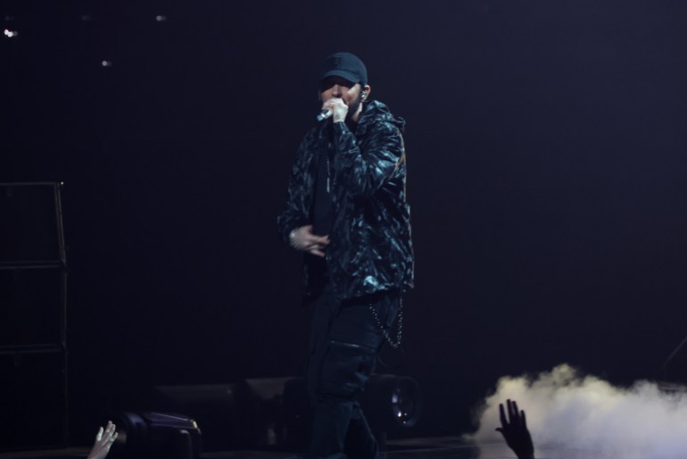 ELMONT, NEW YORK - SEPTEMBER 11: Eminem performs on stage during the 2024 MTV Video Music Awards at UBS Arena on September 11, 2024 in Elmont, New York. (Photo by Johnny Nunez/Getty Images for MTV)