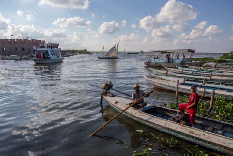 The city of Kafr el-Sheikh. Artists from all over the world travel to Kafr el-Sheikh every year to take part in the International Burullus Art Symposium, during which they paint on walls and boats at the villages around Egypt's lake of Burullus, 13 August 2022, Egypt, Burullus. (Photo by Mahmoud Elkhwas/NurPhoto via Getty Images)