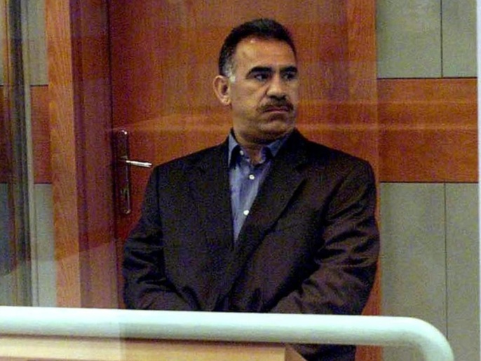 A picture taken on May 31, 1999 shows Abdullah Ocalan, leader of the rebel Kurdistan Workers Party PKK, sitting amidst tight security in a bullet-proof case during his trial at the military prison at Imrali island off Turkish coast, 31 May 1999. The Council of Europe's anti-torture committee on March 6, 2008 urged Turkey to end the solitary confinement of jailed Kurdish rebel leader Abdullah Ocalan highlighting the threat to his mental health.