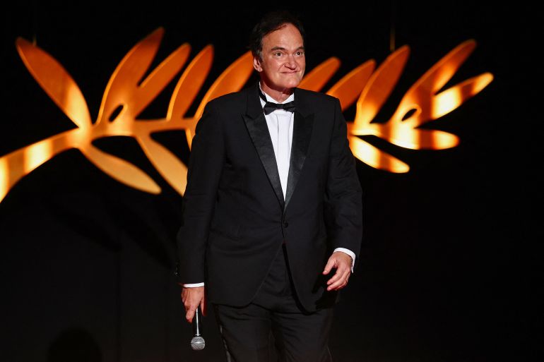 Quentin Tarantino delivers arrives on stage to open the festival during the opening ceremony and the screening the film "Partir un jour" (Leave One Day) Out of competition at the 78th Cannes Film Festival in Cannes, France, May 13, 2025. REUTERS/Sarah Meyssonnier