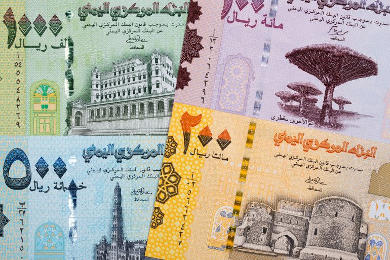 Yemeni rial a business background with money