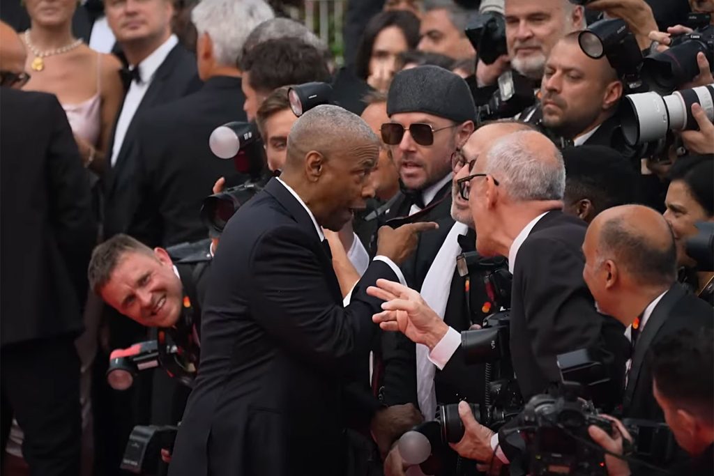 شاهد.. دينزل واشنطن يشتبك مع مصور قبل تكريمه في مهرجان كان