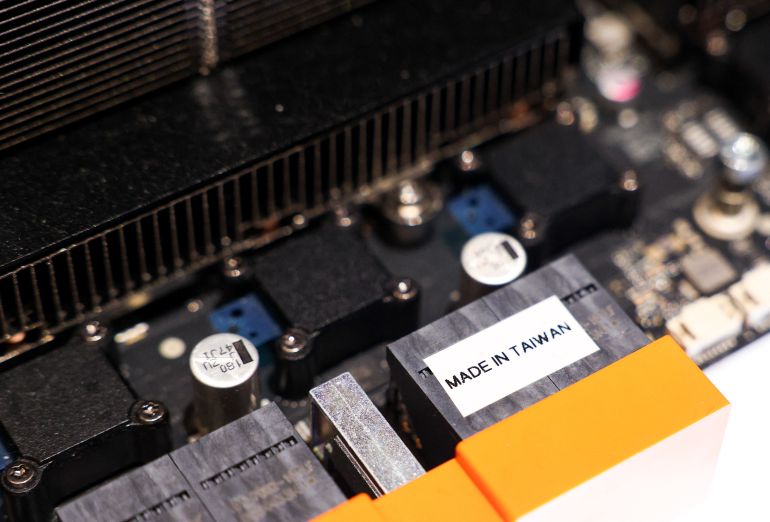 A section of a Nvidia RTX Pro server is displayed during a production preview exhibition in Taipei on May 21, 2025. (Photo by I-HWA CHENG / AFP)