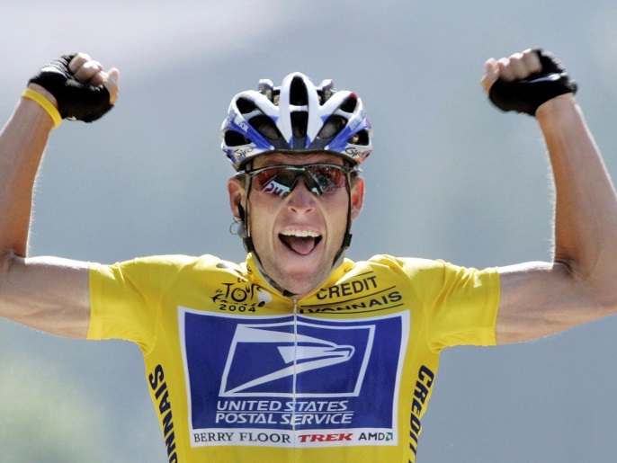 File Photo: U.S. Postal Service Team rider Lance Armstrong of the United States raises his arms as he crosses the finish line to win the 204.5 km long 17th stage of the Tour de France from Bourd-d'Oisans to Le Grand Bornand, France, July 22, 2004. REUTERS/Wolfgang Rattay/File Photo