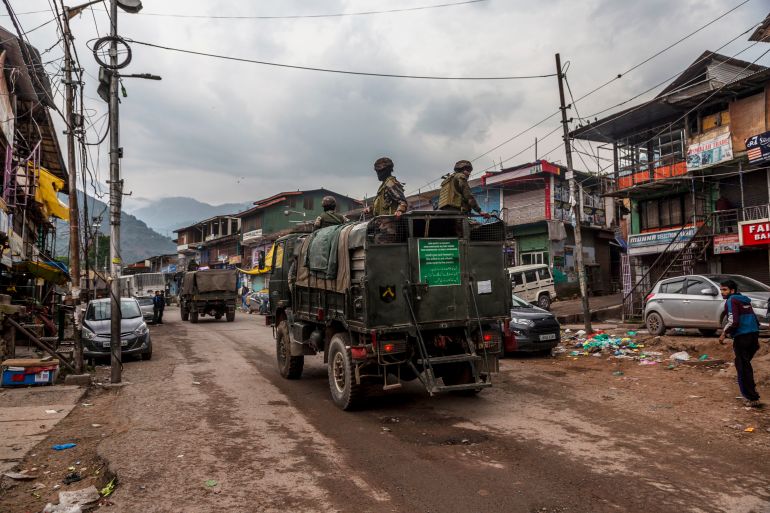 URI, INDIA - MAY 8: An Indian Army convoy carrying reinforcements and supplies drives near Pakistan-administered Kashmir. Stray dogs scavenge from garbage littered across the mostly deserted town of Uri, near the Line of Control (LoC), the de facto border separating Indian-administered Kashmir from Pakistani-administered Kashmir on May 8, 2025 in Uri, west of Srinagar, India. The India-Pakistan standoff has sharply escalated following Indian missile strikes on Pakistan and Pakistani-administered Kashmir in retaliation for a deadly militant attack in Indian Kashmir, with both sides exchanging fire and reporting civilian casualties-the most severe confrontation in over two decades. The international community, including the UK and Iran, have called for restraint and urgent diplomatic dialogue amid fears of further escalation between the nuclear-armed neighbors. (Photo by Yawar Nazir/Getty Images)