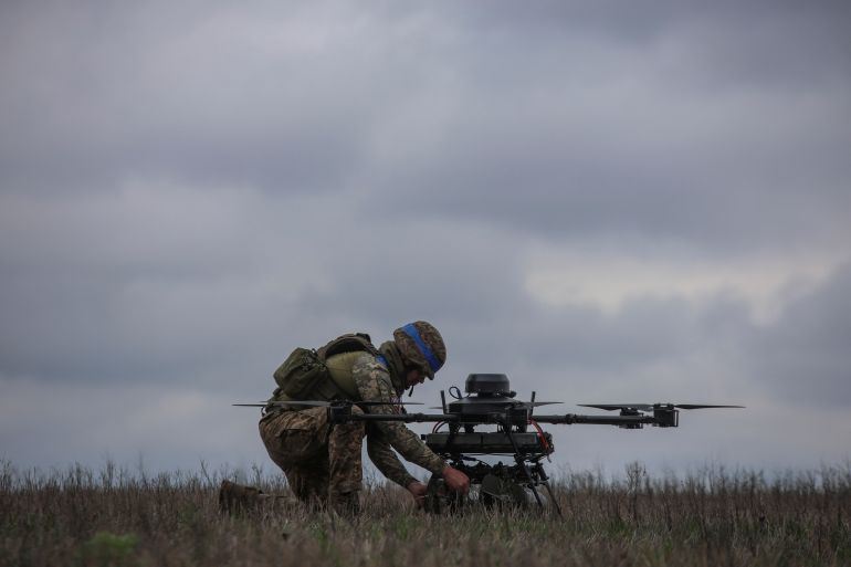A Ukrainian serviceman of the 25th Airborne Brigade prepares a Vampire, a heavy unmanned aerial vehicle, for flight near a front line, amid Russia's attack on Ukraine, in Donetsk region, Ukraine April 5, 2025. REUTERS/Oleksandr Ratushniak