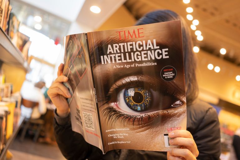 Tigard, OR, USA - Dec 12, 2023: A woman browses a TIME magazine special edition on "Artificial Intelligence: An Age of Possibilities" in a Barnes and Noble bookstore in Tigard, Oregon.