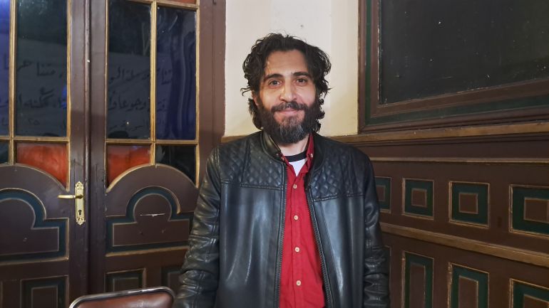 رسام الكاريكاتير أحمد خليل الجلل_ الجزيرة نت_