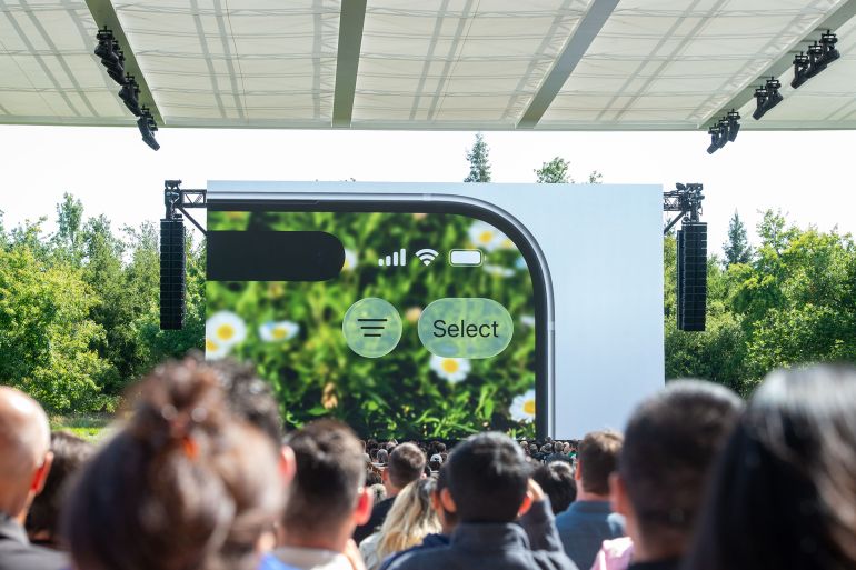 09 June 2025, USA, Cupertino: Apple presents the new look of the user interface of its devices at the Apple developer conference WWDC. It is called "Liquid Glass" and has more transparent elements, the company announced at the conference. Photo: Andrej Sokolow/dpa (Photo by Andrej Sokolow/picture alliance via Getty Images)