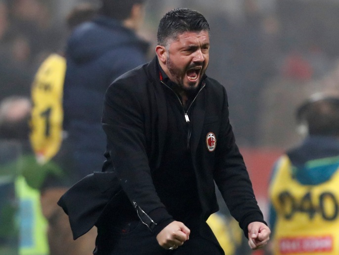 Soccer Football - Serie A - AC Milan vs Lazio - San Siro, Milan, Italy - January 28, 2018 AC Milan coach Gennaro Gattuso celebrates their second goal scored by Giacomo Bonaventura REUTERS/Alessandro Garofalo