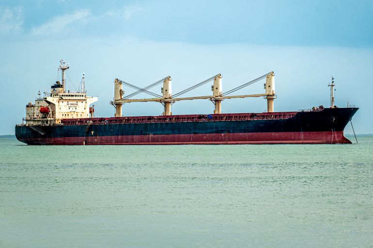 unrecognizable ship, an oil tanker sailing through Red Sea along coast of Yemen. transportation of oil and goods important for global economy by sea. Tanker ship moving on the sea