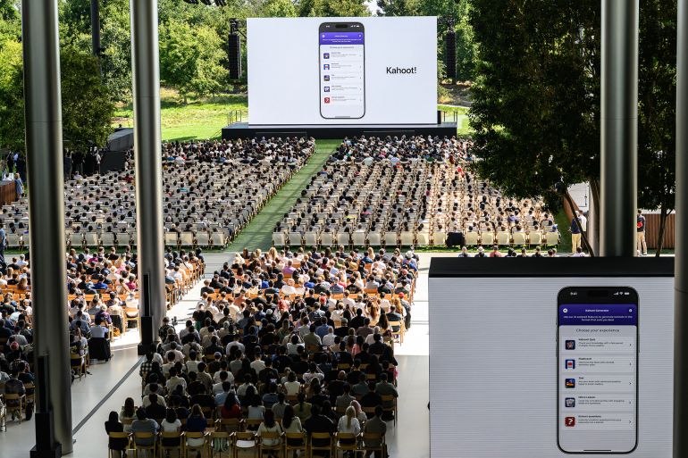 Apple announces upgrades to their AI system, "Apple Intelligence," during the annual Apple "Worldwide Developers Conference" (WWDC) at Apple Park, the corporate headquarters of Apple Inc., in Cupertino, California on June 9, 2025. Pressure is on Apple to show it hasn't lost its magic despite broken promises to ramp up iPhones with generative artificial intelligence (GenAI) as rivals race ahead with the technology. Apple will showcase plans for its coveted devices and the software powering them at its annual Worldwide Developers Conference (WWDC) kicking off Monday in Silicon Valley and running through June 13. (Photo by Josh Edelson / AFP)