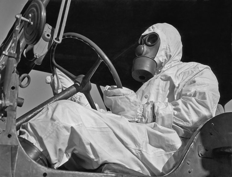 A scientist in a protective suit at the French nuclear testing site in Reggan, Algeria in 1960. (Photo by Authenticated News/Archive Photos/Getty Images)