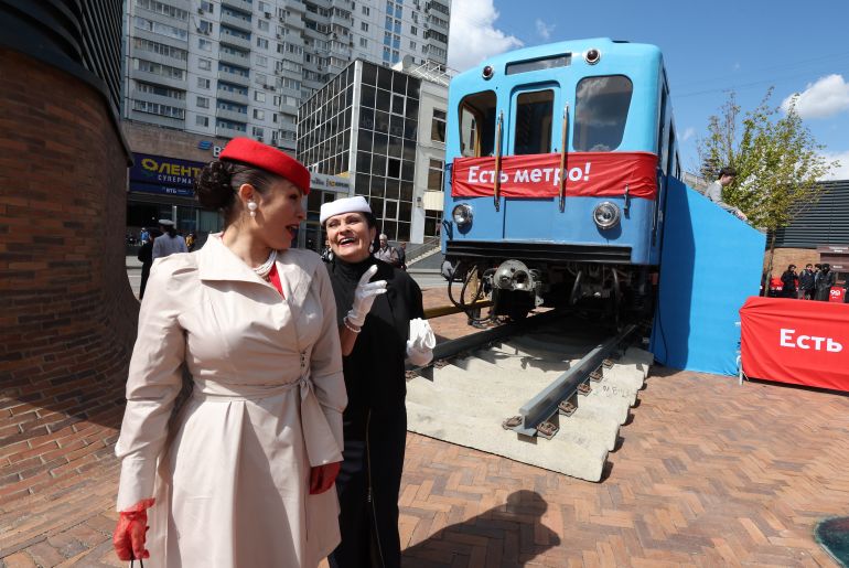 epa12102615 People attend celebrations of the 90th anniversary of the Moscow Metro near the Sokolniki metro station in Moscow, Russia, 15 May 2025. The first line of Moscow Metro was opened in 1935 and included 13 stations. EPA-EFE/MAXIM SHIPENKOV