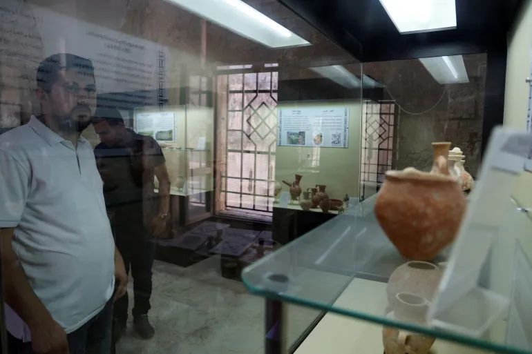 Palestinians visit the museum in Sebastia. It is already hard for them to visit the archaeological park because of settler attacks and the Israeli military presence [File: Raneen Sawafta/Reuters]