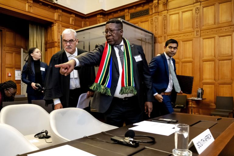 Asset ID: 14356501b Second Day of Hearings on Israeli Occupation of Palestinian Territories, Hague, Netherlands - 20 Feb 2024 THE HAGUE - Ambassador Vusimuzi Madonsela (r) of South Africa during a hearing at the International Court of Justice (ICJ) on the legal consequences of the Israeli occupation of Palestinian territories. Various countries have their say during hearings. (شترستوك)