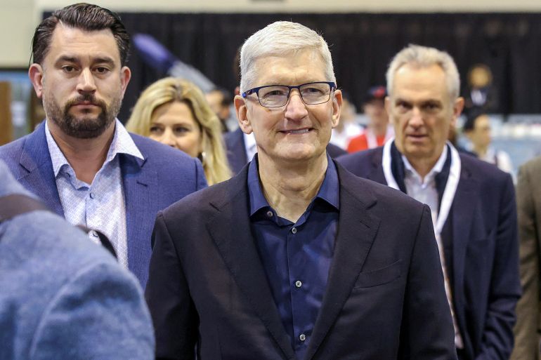 Apple CEO Tim Cook arrives for the Berkshire Hathaway Inc annual shareholders' meeting, in Omaha, Nebraska, U.S., May 4, 2024. REUTERS/Scott Morgan
