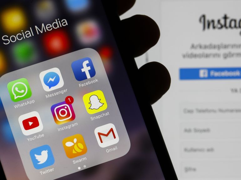 Social Media Applications- - ANKARA, TURKEY - SEPTEMBER 04: Icons of WhatsApp Messenger messaging and Voice over IP service, Instagram social networking service, Social network company Facebook, YouTube video sharing company, Snapchat multimedia messaging app, Twitter news and social networking service, Swarm mobile app, Facebook Messenger messaging platform and Gmail email service applications are seen on a screen of smart phone in Ankara, Turkey on September 04, 2018.