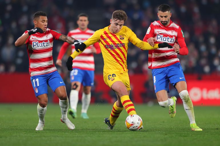 Granada CF v FC Barcelona - La Liga Santander GRANADA, SPAIN - JANUARY 08: Nico Gonzalez of FC Barcelona runs with the ball during the La Liga Santader match between Granada CF and FC Barcelona at the Nuevo Estadio de Los Cármenes in Granada, Spain (Photo by Fran Santiago/Getty Images