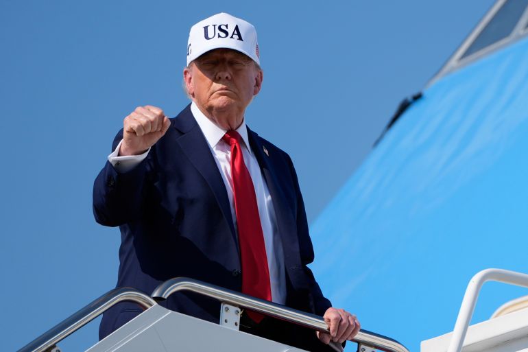 President Donald Trump gestures as he boards Air Force One, Thursday, July 3, 2025, at Joint Base Andrews, Md. (AP Photo/Alex Brandon)