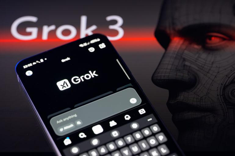 The Grok X AI app displays on a mobile phone with the Grok X AI logo, as seen in this photo illustration in Brussels, Belgium, on February 16, 2025. (Photo by Jonathan Raa/NurPhoto via Getty Images)