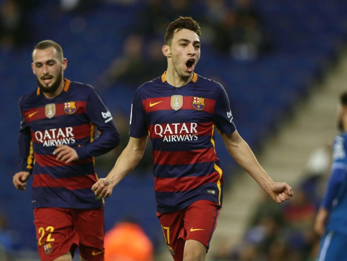 FC Barcelona's striker Munir El Haddadi (R) jubilates his goal against RCD Espanyol during their Spanish King's Cup round 16 second leg soccer match played at Power8 Stadium in Cornella-El Prat, Barcelona, Spain, 13 January 2016.