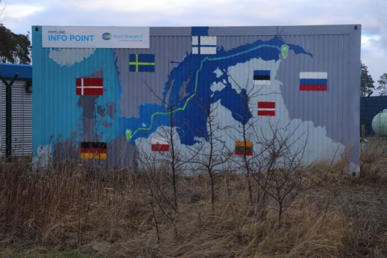 LUBMIN, GERMANY - FEBRUARY 02: A map shows the course of the Nord Stream 2 gas pipeline from Russia to Germany on the exterior of an informational booth close to the receiving station for Nord Stream 2 on February 02, 2022 near Lubmin, Germany. Nord Stream 2, which is owned by Russian energy company Gazprom, is to transport Russian natural gas from Russia to Germany along over 1,200km of twin pipeline stretching across the bottom of the Baltic Sea. While Nord Stream 2 was completed in September of 2021, operation has been held up by German regulators. Most recently both German and EU officials have raised the possibility of halting Nord Stream 2 due to the build-up of Russian military forces on the border to Ukraine. The build-up has stoked international fears of an imminent military invasion. (Photo by Sean Gallup/Getty Images)