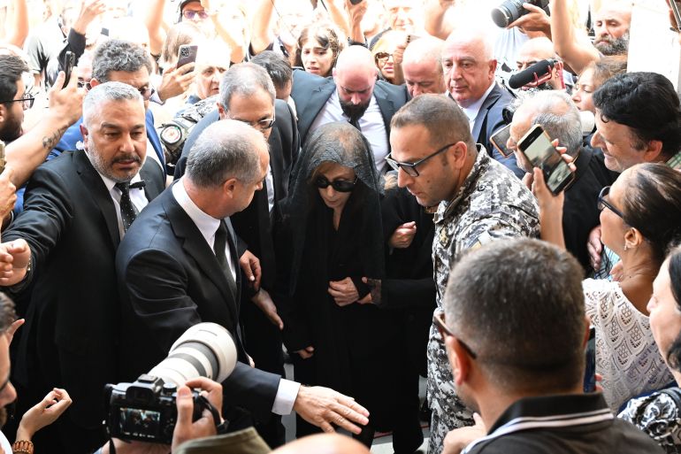 MATN, LEBANON - JULY 28: World-renowned artist Fairuz attends the funeral of her son, Lebanese composer and playwright Ziad Rahbani, 69, as the ceremony takes place at the Church of the Dormition of the Virgin Mary in Mahaydetta, a village in the Matn district's Bikfaya area in Lebanon on July 28, 2025. (Photo by Houssam Shbaro/Anadolu via Getty Images)