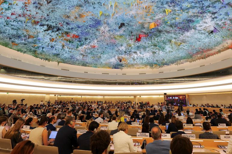 FILE PHOTO: Delegates watch, as Iran's Foreign Minister Araghchi addresses a special session of the Human Rights Council at the United Nations in Geneva, Switzerland, June 20, 2025. REUTERS/Denis Balibouse/File Photo