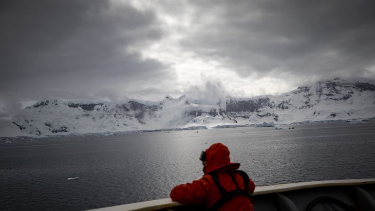 Race for research at continent of science and peace Antarctica- - ANTARCTICA - FEBRUARY 08 : Assistant Prof. Dr. Burak Karacik, Istanbul Technical University - Faculty of Naval Architecture and Ocean Engineering, watches the view from deck as they pass through the Lemaire Channel, Antarctica, Polar Regions on February 08, 2019. Turkish scientific research team began their journey within the 3rd National Science Antarctica Expedition, under the auspices of Presidency of