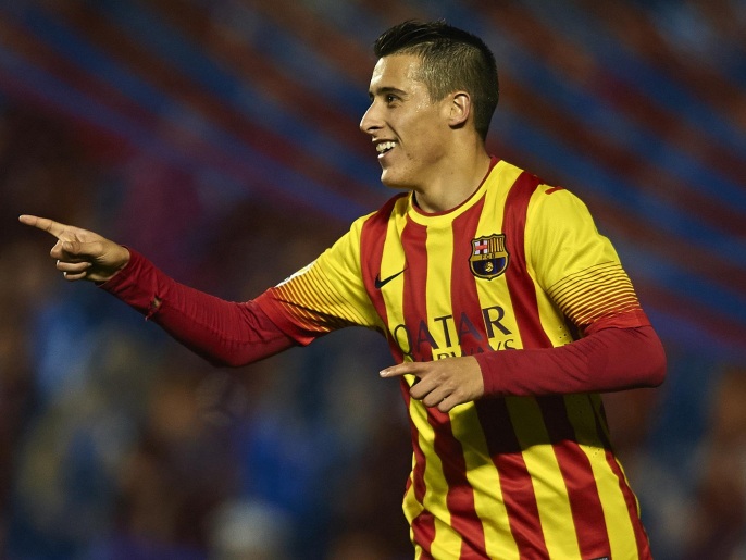 VALENCIA, SPAIN - JANUARY 22: Cristian Tello of Barcelona celebrates after scoring during the Copa del Rey Quarter Final First Leg match between Levante UD and FC Barcelona at Ciutat de Valencia on January 22, 2014 in Valencia, Spain.