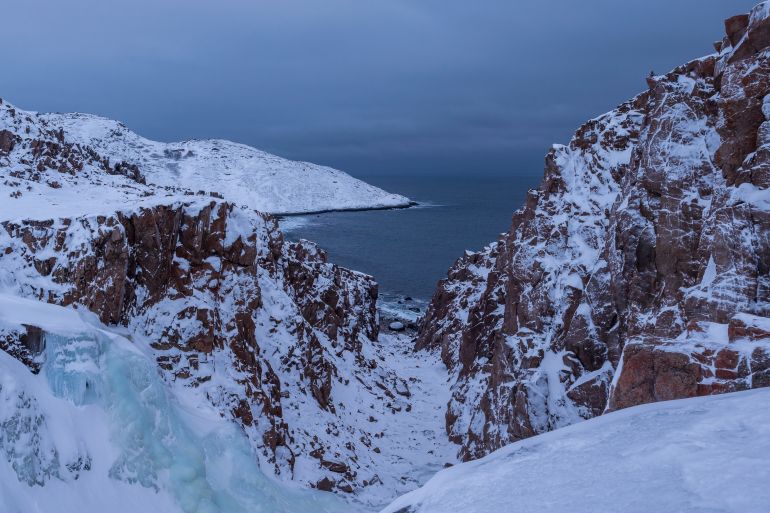 Frozen waterfall in the vicinity of Teriberka, Murmansk region, Barents Sea, Far North, Russia, Arctic Ocean; Shutterstock ID 2097823099; purchase_order: AJA; job: ; client: ; other: