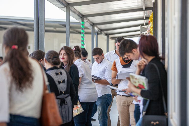 ERBIL, IRAQ - MAY 29, 2016: Iraqi students at Hamdaniya University, a higher education institution relocated to Erbil following the seizure of swathes of Iraq's territory by the Islamic State in 2014.; Shutterstock ID 2605953651; purchase_order: aj; job: ; client: ; other: