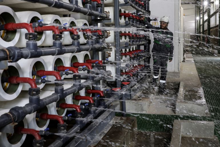 A technician works at the OCP desalination plant in Morocco's coastal city of Safi on July 23, 2024. - As Morocco grapples with the increasingly volatile effects of climate change, King Mohammed VI has pledged that desalination will provide more than 1.7 billion cubic metres per year and cover more than half of the country's drinking water needs by 2030. (Photo by AFP)
