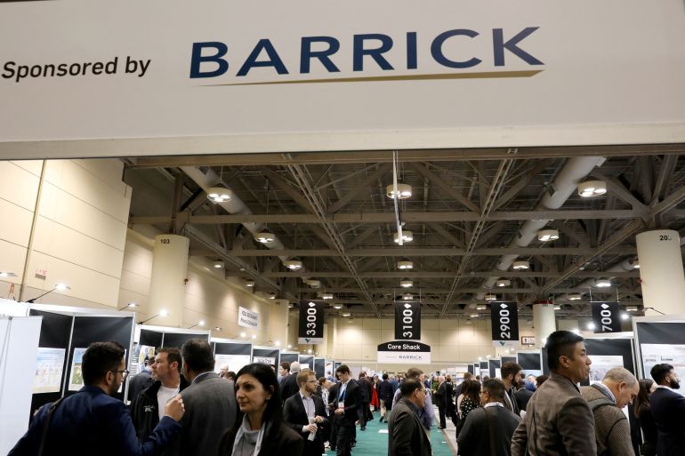 People visit a section sponsored by Canadian headquartered mining company Barrick Gold Corporation at the Prospectors and Developers Association of Canada (PDAC) annual conference in Toronto, Ontario, Canada March 7, 2023. REUTERS/Chris Helgren