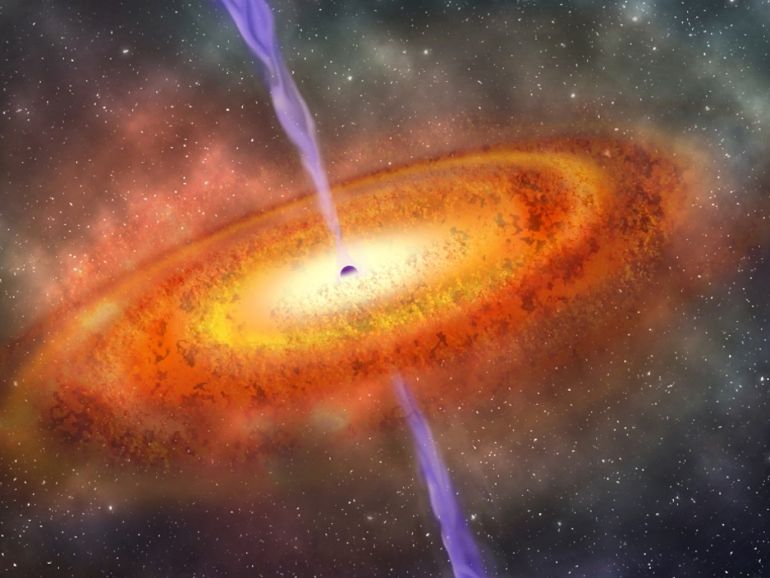 Artist's conception of the most-distant supermassive black hole ever discovered, which is part of a quasar from just 690 million years after the Big Bang is shown in this illustration released on December 6, 2017. Courtesy Robin Dienel/Carnegie Institution for Science/Handout via REUTERS ATTENTION EDITORS - THIS IMAGE HAS BEEN SUPPLIED BY A THIRD PARTY. FOR EDITORIAL USE ONLY. NO RESALES. NO ARCHIVES
