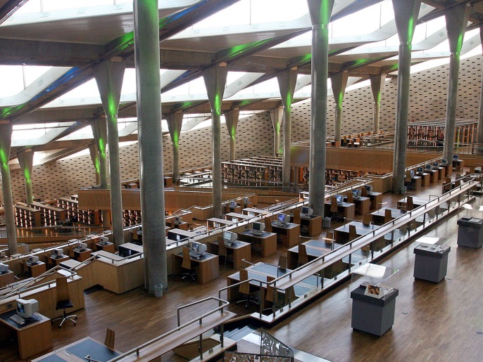 A view of the inner hall of the Bibliotheca Alexandrina March 28, 2005. The ultramodern, 11-storey disc-shaped structure standing on the Chatby Corniche in Alexandria evokes the legacy of the ancient Alexandria library and the Temple of the Muses, the Mouseion, where the Old Testament was translated into Greek from Hebrew for the first time. The institution and the city came to symbolise diversity, culture and learning, and it was the point at which cultures and civilisations met and flourished. Picture taken March 28, 2005. REUTERS/Aladin Abdel Naby AN