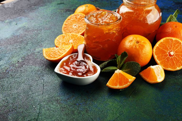 mandarin homemade jam marmelade in a glass jar. fresh juicy jelly
