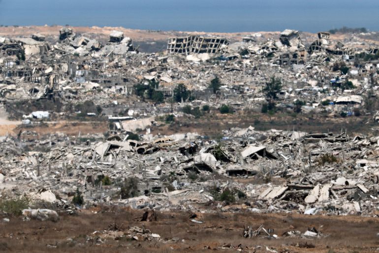Destroyed buildings in the Gaza Strip are pictured from a position along Israel's southern border with the besieged Palestinian territory on August 5, 2025.
