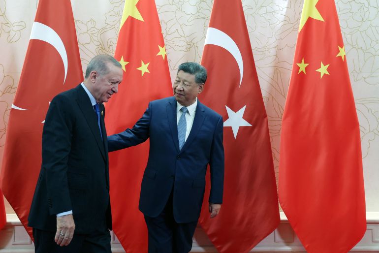 This handout photograph taken and released by Turkish Presidency Press Office on August 31, 2025, shows Turkish President Recep Tayyip Erdogan (L) meeting with China’s President Xi Jinping (R) as part of his visit to attend Shanghai Cooperation Organization (SCO) summit in Tianjin.